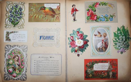 A photograph album and an album of 19th century and later greetings cards and postcards